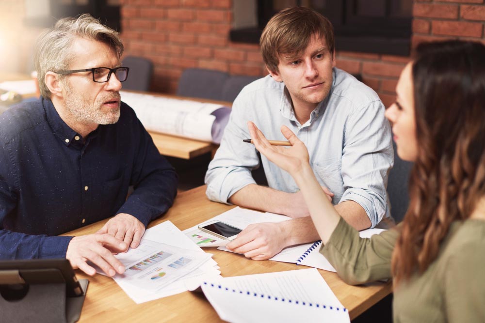 team discussing financial concerns