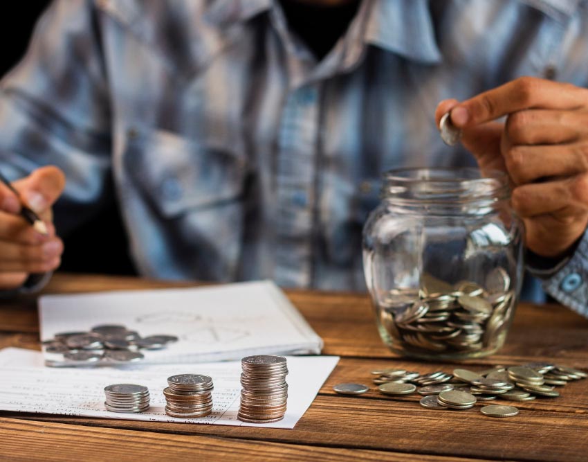 man counting savings